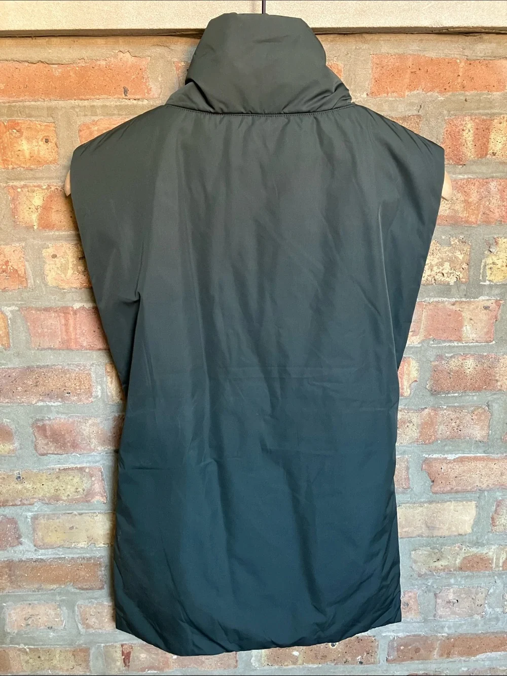 dark green COS high-neck padded vest